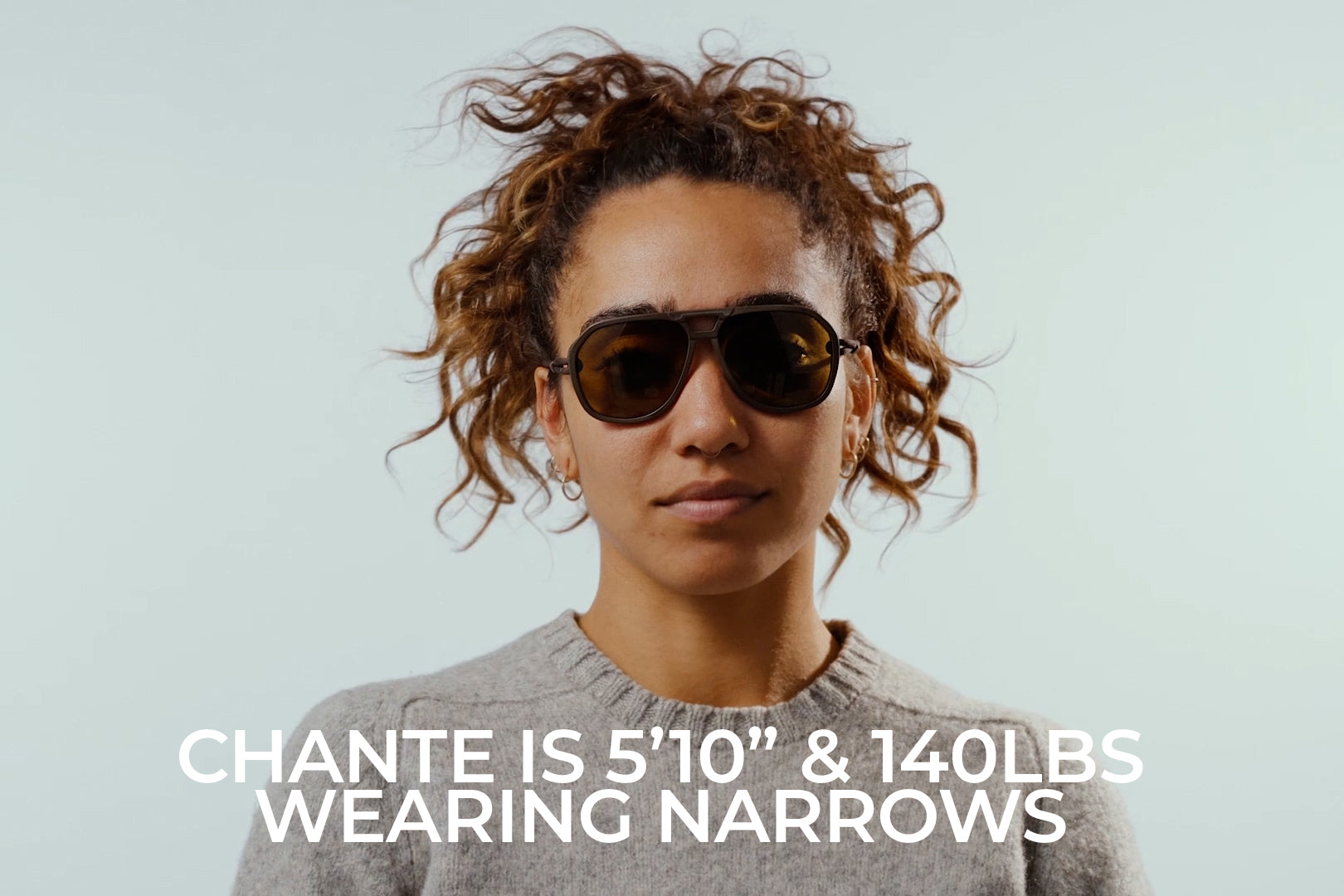 mattebrown_yellow_thumbnail_sizing Woman putting on Ombraz classic armless rope sunglasses
