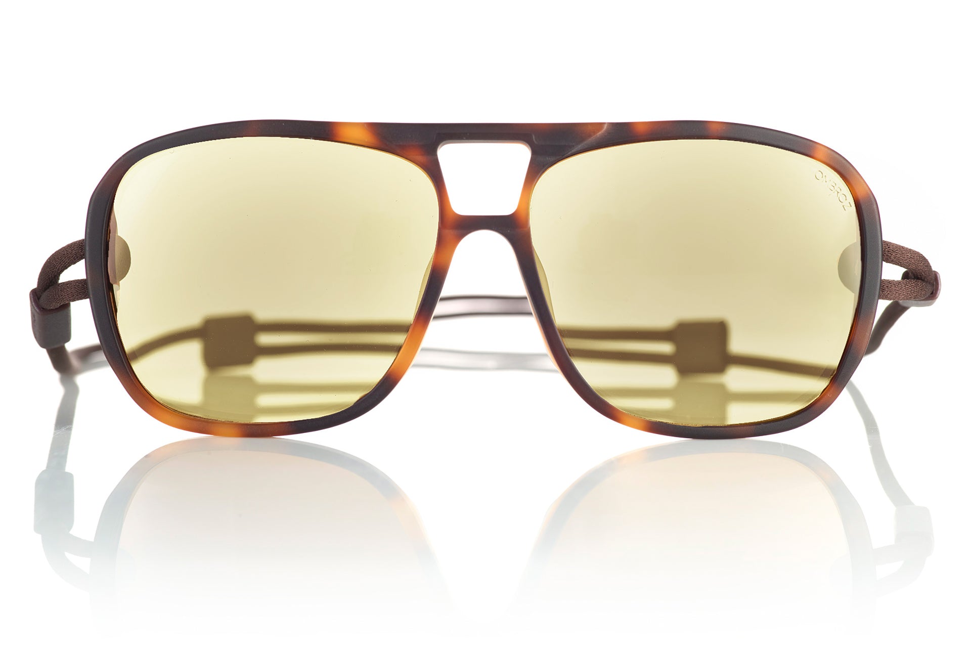 leggero_tortoise_blocker Close up of Ombraz leggero armless sunglasses with cord