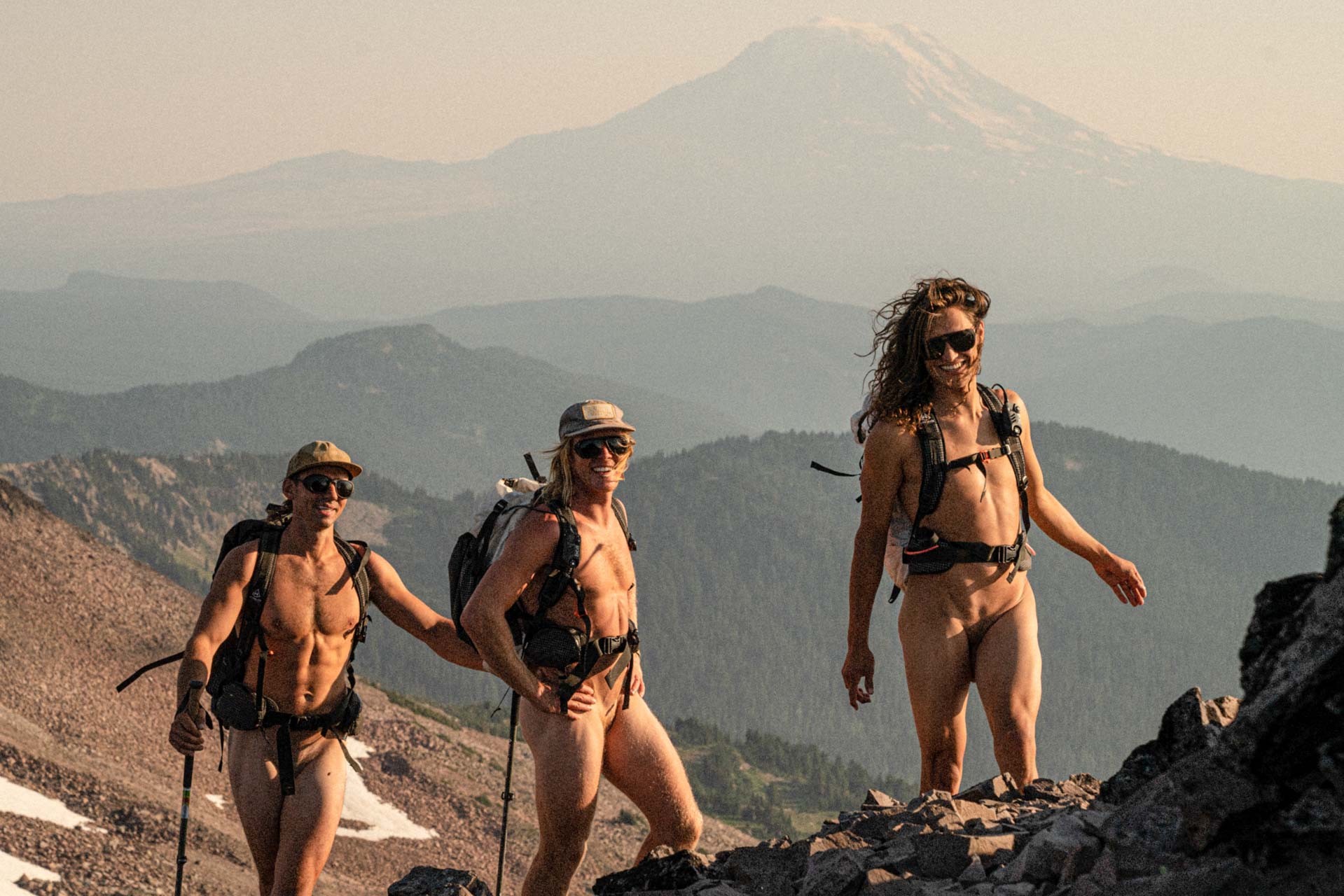 teton_charcoal_grey Group of guys hiking wearing Ombraz armless rope sunglasses