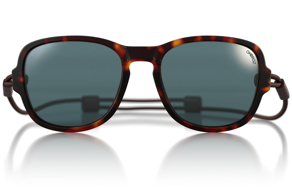teton_tortoise_grey Close up of Ombraz teton armless sunglasses with cord