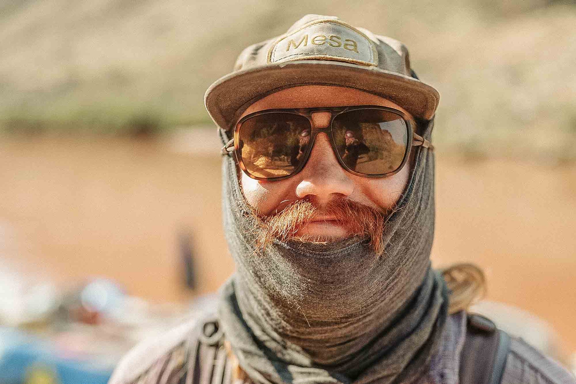 leggero_tortoise_brown Portrait of bearded man wearing Ombraz leggero sunglasses without arms